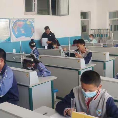 库尔勒市第十九中学举行初中学业水平测试物化生实验艺术考查活动