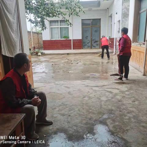 泾干街道大训堡村开展″中秋佳节爱在行动"志愿服务活动。