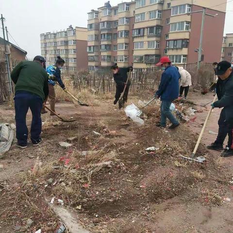 万新街道虎万路社区开展清洁月活动