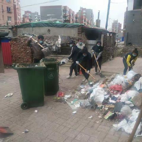 万新街道虎万路社区开展“美化环境，洁净城市”活动