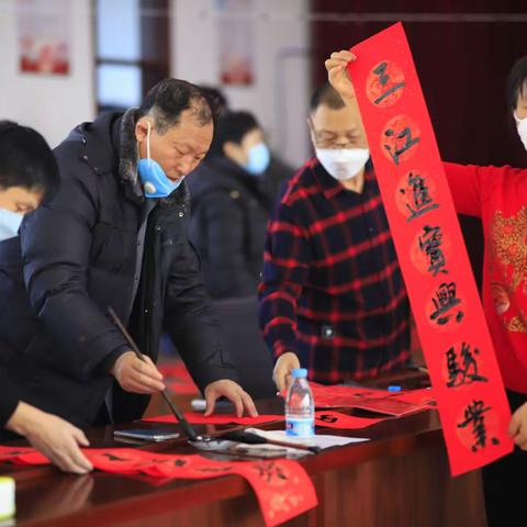 北安市文联组织开展《翰墨书香进万家》迎新春送春联活动