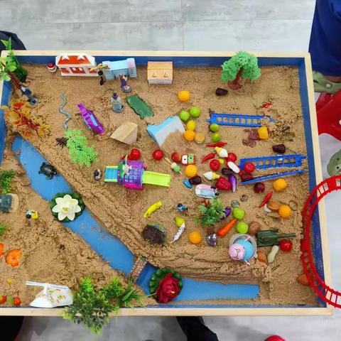 海滨社区“沙绘世界 以心交流”儿童团体沙盘游戏体验活动
