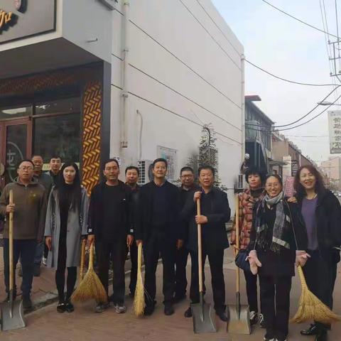 清洁街道卫生，扮靓文明县城——教育局机关第二党支部进行“不忘初心、牢记使命“主题教育活动之抓落实