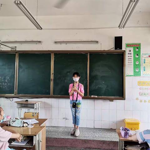 洛龙区安乐明德小学四年级——“诗歌伴成长，书香溢校园”