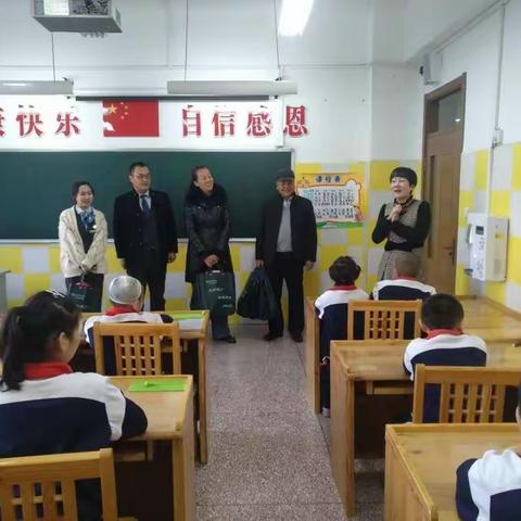 幸福花园支行党支部开展“学雷锋银行，进盲校献爱心”主题党日活动