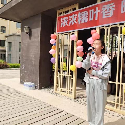 【石榴籽  同心筑梦  】科右中旗党群服务中心图什业图社区开展“浓浓糯叶香   暖暖邻里情”端午活动