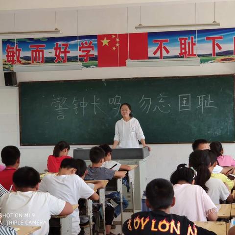 鱼城镇洪庙小学举行了防空应急疏散演练活动