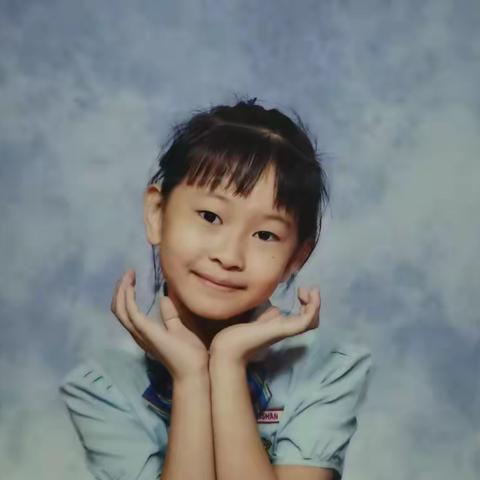 宝贝孙女艺珊八岁啦！