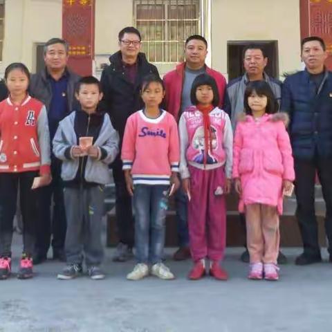 钟山乡中心学校党支部‘‘爱心助学行动’’