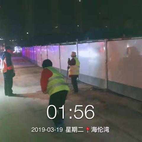 海伦湾二期洒水清扫道路照片