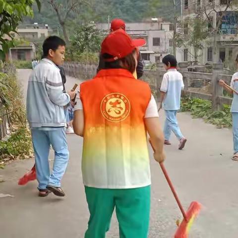 覃坑小学开展“小手拉大手，争当‘创卫’小标兵”主题教育活动