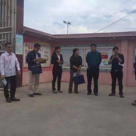 玉林市专家督查组深入沙湖镇永安小学进行义务教育均衡发展工作专项督查