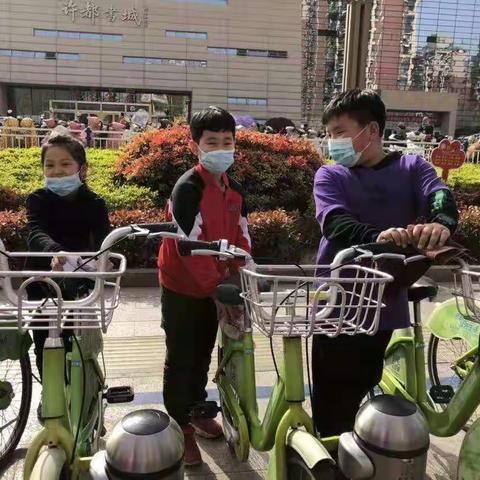 毓秀路小学四（8）班第四小组向阳队——文明城建我们在行动