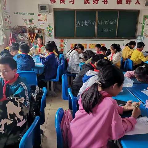 五年级联合中队“测量不规则物体的体积”数学综合实践活动