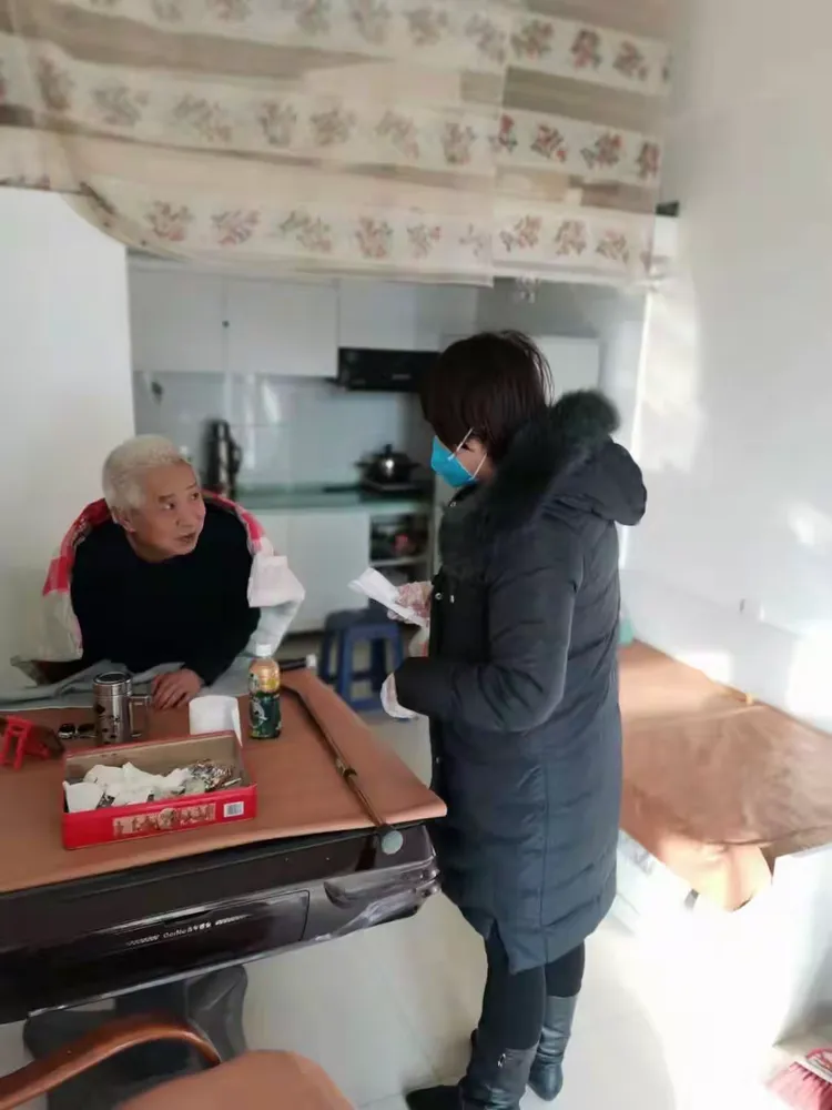 战“疫”社区英雄传之向阳花开金丽红