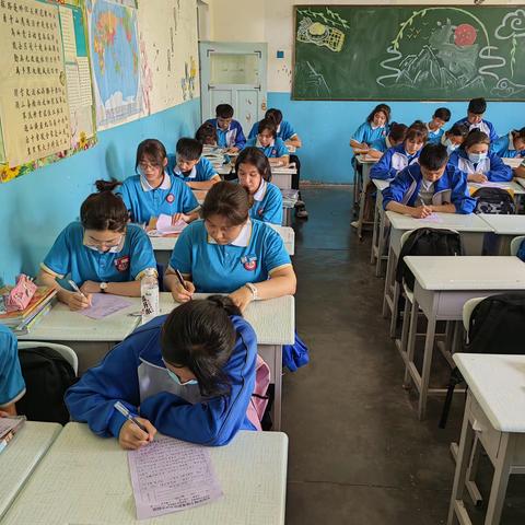 《同写一封信》记湘潭市一中高一14班与高昌区第二中学高一22班同写一封信活动