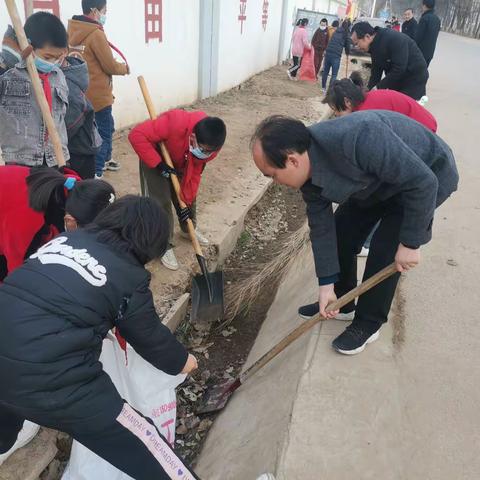 学雷锋，共建和谐家园--党员教师和少先队员在行动