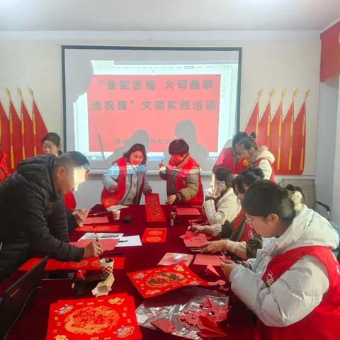 寺坡街道龙泉社区开展“金蛇送福，义写春联送祝福”文明实践活动