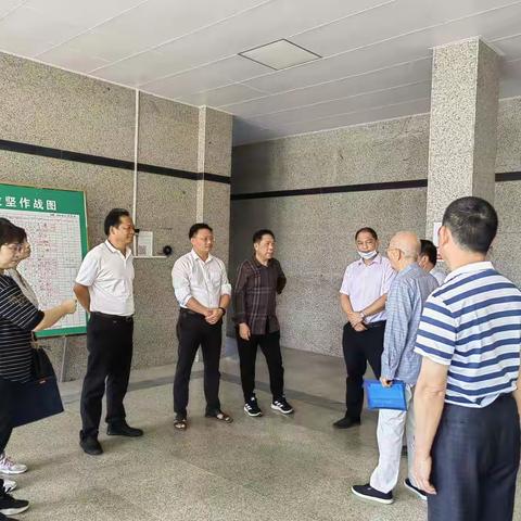 电白区关工委主任梁小江一行莅临那霍镇学校调研