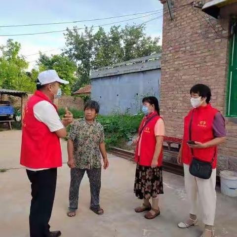 高温难挡志愿红——聚力志愿者家访希望小屋