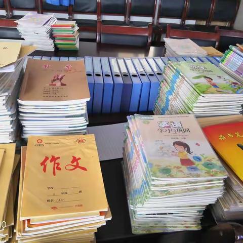 抓常规    促教学——信合路小学开展作业教案常规检查活动