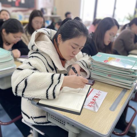 金华市荣光学校数学组集体备课之四十九———聚焦新课标，蓄力共成长