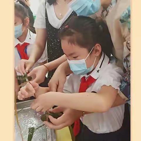 黎明小学工会举行“浓情端午 传承文化”师生包粽子活动