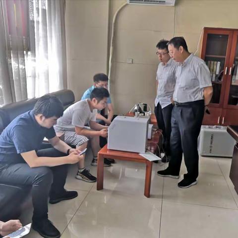 莱芜金融科技部与省行金融科技部专家前往钢城支行调试外派终端设备