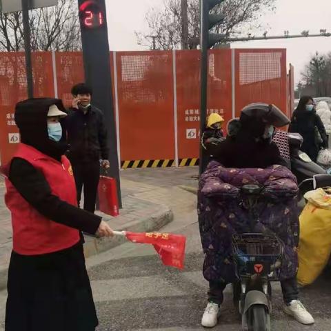 秦都区统计局开展文明交通劝导志愿服务活动