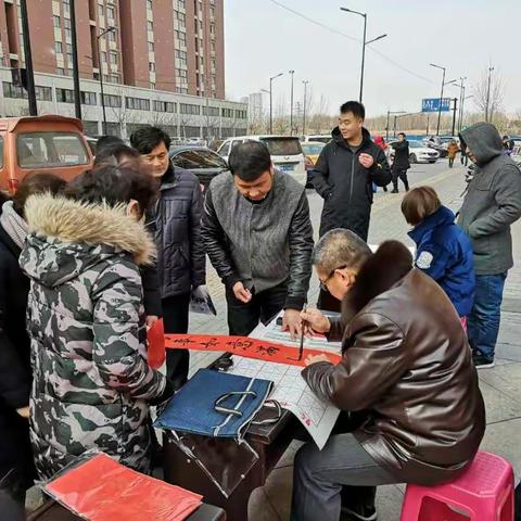 西郊乡工会开展新春送春联活动