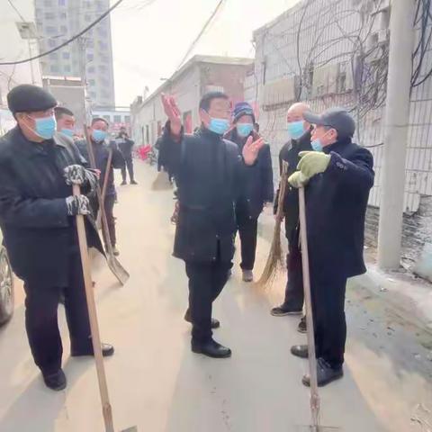党旗飘扬在村庄，党员群众在行动––––南沿村镇西街村开展“迎新春大扫除美环境”卫生清扫活动
