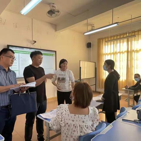 龙门县能力提升工程2.0专家指导组到麻榨镇中心小学指导工作