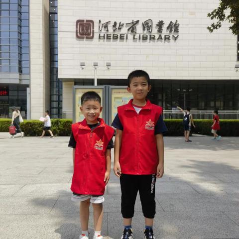 绿洲小学一年级9班暑期社会活动-我是义务图书管理员