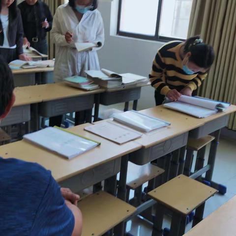 内乡县余关镇:作业展评亮风采，集体教研促发展