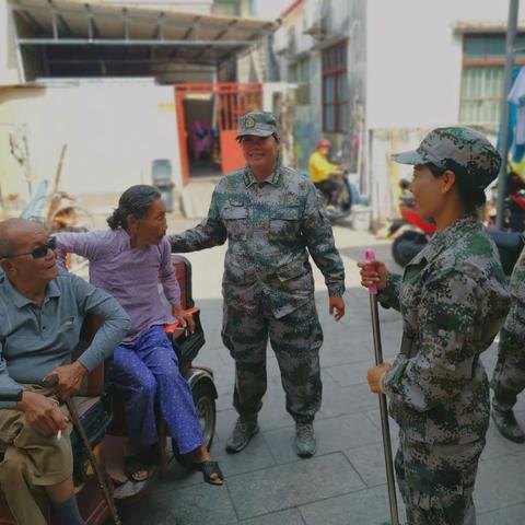 三亚市天涯区西岛女民兵开展“学雷锋，送温暖”活动