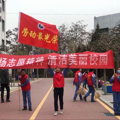 我劳动，我光荣
——八四班全体同学参加清洁校园活动