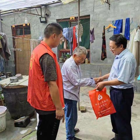 迎七一送温暖，走访慰问暖人心