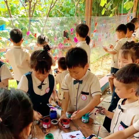 涂鸦缤纷世界，绘染五彩童年——雨欣幼儿园户外彩绘主题活动