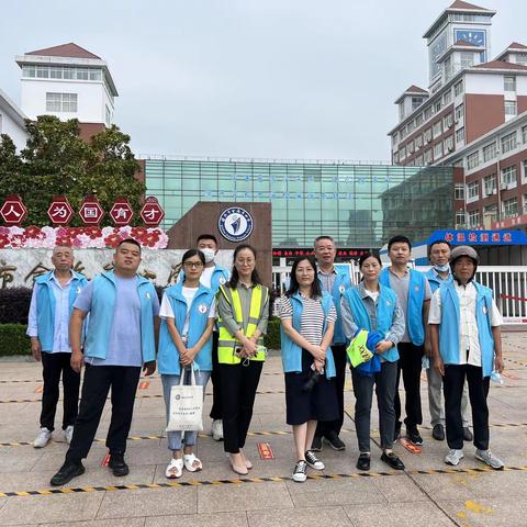 细雨中守护，微风中前行——金海岸小学五年级11班护学执勤纪实