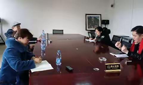 资中县文物保护志愿服务队向县文物保护中心领导汇报工作纪实二0二三年二月一日。摄影：李世元。