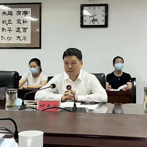 区长何长成会见国银华夏有限公司张峰董事长一行