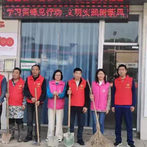 富溪村开展“学习雷锋见行动，文明实践树新风”主题活动——泥泞道路“我来清”