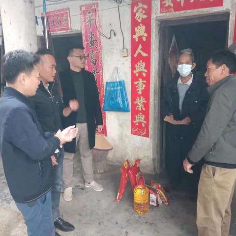 玉龙村开展“迎春送暖”主题党日活动