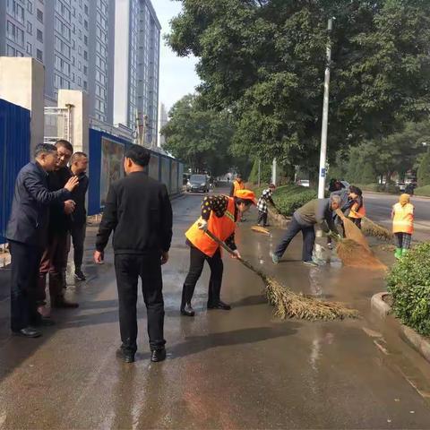 综合执法采取多种措施     有效确保道路清洗进度