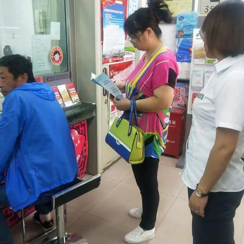 邮政储蓄银行灵武市农场营业所反假币宣传