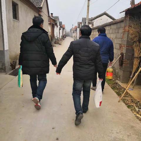 寨里镇计生协会关爱特殊家庭，春节送暖活动