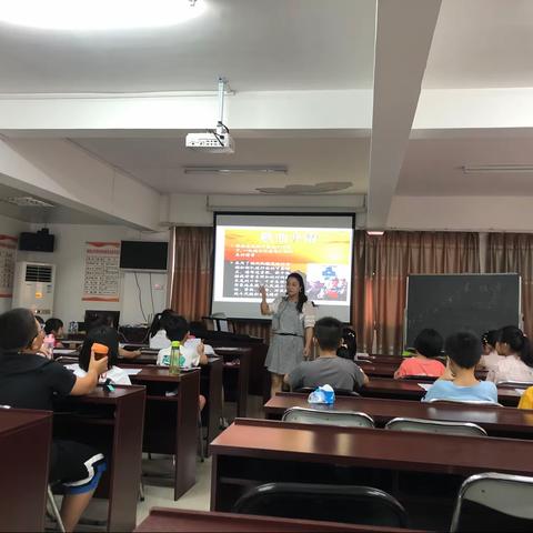 西园社区四点半学校开展“花开正少年 红心永向党”红歌教唱活动