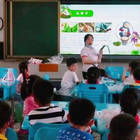 彩绳纳吉粽飘香，传承千年爱国情——庐山路小学一年级端午传统节日课程