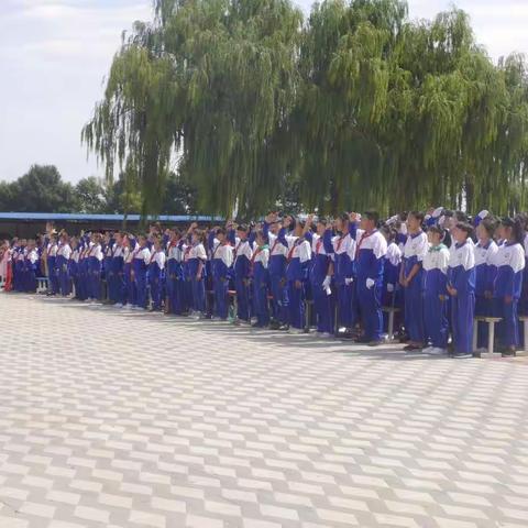 龙洲九年制学校举行“庆祝祖国母亲成立70周年”歌咏比赛