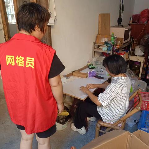 和徳村网格员炎炎夏日走访慰问残疾人